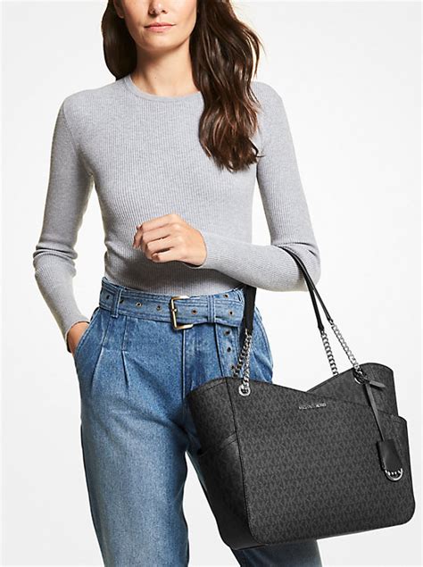 michael kors jet set medium vs large